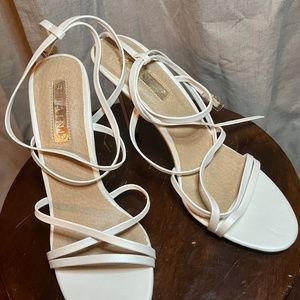 Previously gently worn, White/ ivory size 9 Billini Ophelia Heels. 2 straps